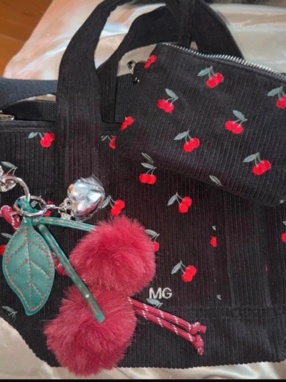 Madden Girl Black Cherry Mini Tote with Red Pom Charm